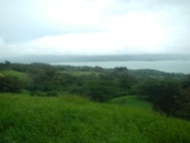 Vista overlooking Lake Arenal, which is formed by a dam at the eastern end.